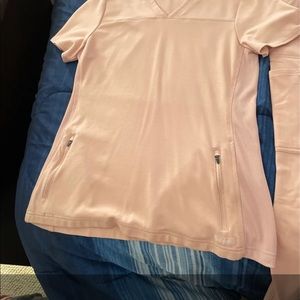 Light pink jaanuu woman’s scrubs